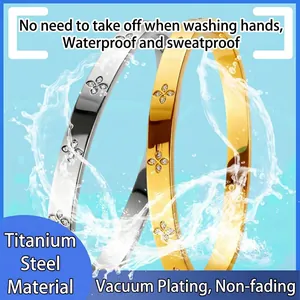Waterproof gold and silver titanium steel bangles with floral pattern and tiny crystals