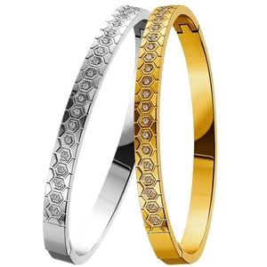Polished titanium steel bracelets with honeycomb patterns and inlaid diamonds