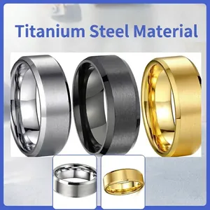 Lot de trois bagues en acier titane brossé de couleurs argent, noir et doré
