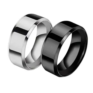 Polished silver and black titanium steel rings in a wide band minimalist design