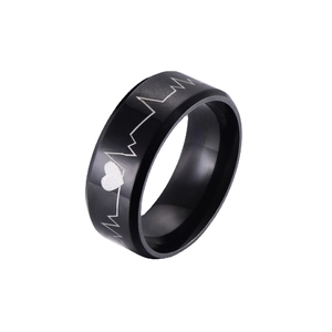 Minimalist black stainless steel ring with laser engraved heart rate and heartbeat pattern