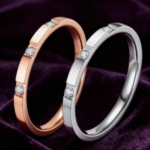 Minimalist titanium steel rings in rose gold and silver with three cubic zirconia stones