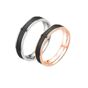 Minimalist stainless steel couple rings in silver and rose gold with black enamel inlay