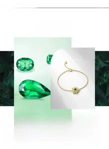 Détail macro du bracelet marguerite dorée avec cœur émeraude et pétales en zircon