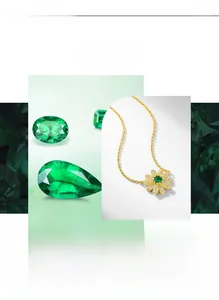 Detail of daisy flower pendant with emerald green stone and sparkling white zircons