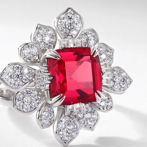 Vintage floral silver cocktail ring with large rectangle red gemstone and diamonds