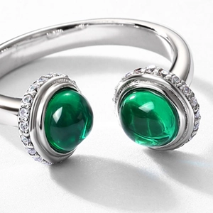 Luxurious S925 silver open ring featuring two oval lab-grown emeralds with pavé zircon