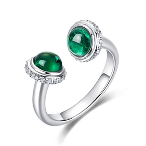 Luxurious S925 silver open ring featuring dual green emerald cabochons with halo accents