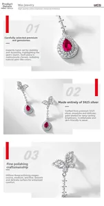 Détail de boucles d'oreilles papillon en argent S925 avec rubis rouges taille poire et diamants