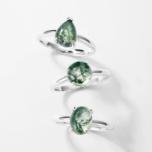 Three minimalist S925 silver rings with pear, round, and oval green moss agate stones
