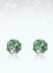 Close-up of geometric natural moss agate stud earrings set in S925 sterling silver
