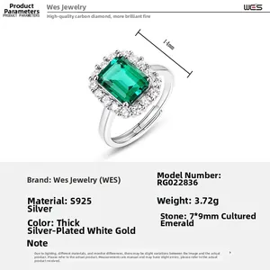 Detailed view of emerald cut lab-grown gemstone ring with diamond halo and S925 silver band