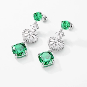 Elegant S925 silver drop earrings featuring green cushion-cut gemstones and heart accents