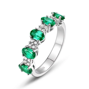 Bague élégante en argent S925 avec émeraudes ovales et petits diamants blancs ronds
