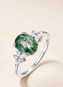 Detailed view of oval green moss agate ring showing S925 sterling silver hallmark