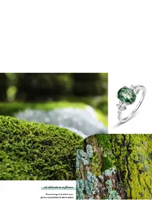 Macro detail of oval green moss agate ring with S925 silver setting and side stones