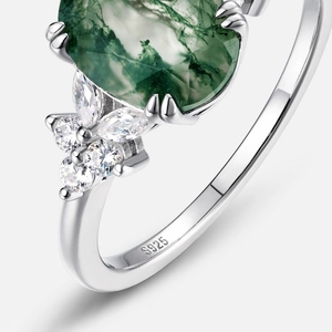 S925 silver ring featuring oval green moss agate and marquise zircon accents