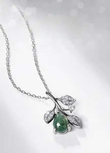 Detailed view of S925 silver leaf pendant with water grass agate and micro-set zircons