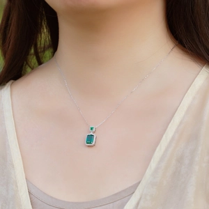 Elegant S925 silver necklace with rectangular emerald pendant and sparkling diamonds