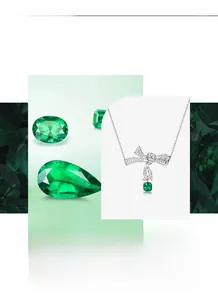 Macro detail of S925 silver bow necklace with cushion-cut emerald and cubic zirconia