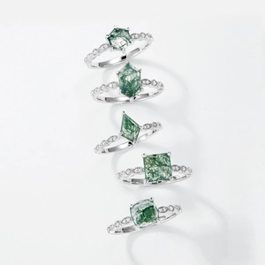 Set of S925 silver moss agate rings in hexagon kite and square cuts on white background