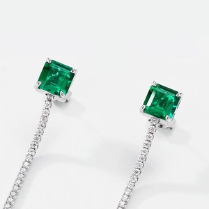 Élégantes boucles d'oreilles pendantes en argent S925 avec émeraude et diamants brillants