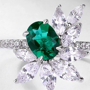 S925 silver ring with oval emerald gemstone and marquise-cut white crystals