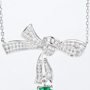 Bow-knot S925 silver necklace with cushion-cut emerald pendant and white zircon inlay