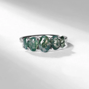 S925 silver ring with five oval moss agates in a classic prong setting with natural lighting