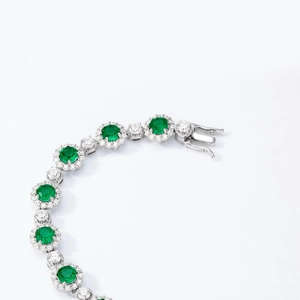 Elegant S925 sterling silver emerald bracelet featuring round halo cluster settings