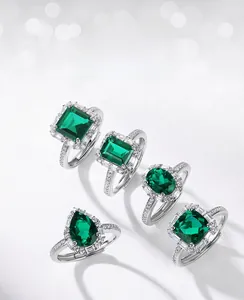 Detailed view of various lab-grown emerald cut shapes with halo setting in S925 silver