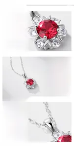 Macro shot of S925 silver flower necklace featuring a lab-grown ruby and zircons