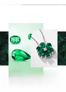 Detailed view of flower necklace pendant with pear-cut emerald petals and silver chain