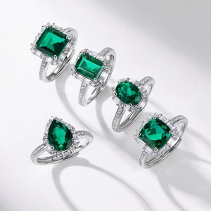 Set of five adjustable S925 silver emerald rings with various classic gemstone cuts