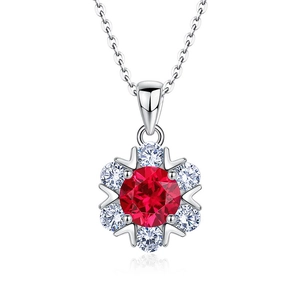 S925 silver snowflake necklace featuring a central red ruby gemstone on white background