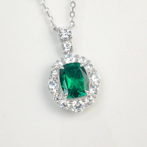Vintage S925 silver necklace with rectangular emerald pendant and diamond halo surround