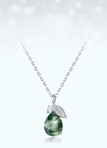 Macro shot of green moss agate teardrop pendant with silver leaf detail and S925 chain