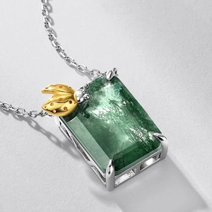 Elegant S925 silver necklace featuring a green moss agate pendant with a gold ladybug detail