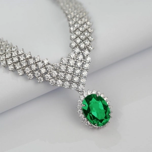 Luxury S925 silver necklace with large oval green gemstone pendant and pave diamonds