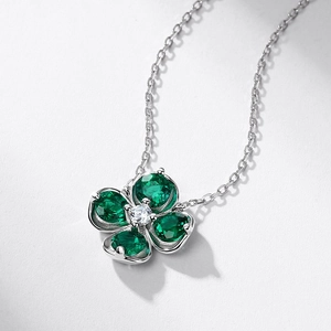 S925 sterling silver four-leaf clover necklace with green crystal petals and white diamond