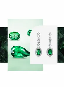 Gros plan des boucles d'oreilles émeraude avec pierres vertes et diamants blancs
