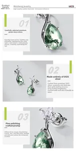 Detailed view of teardrop moss agate earrings with S925 sterling silver leaf design