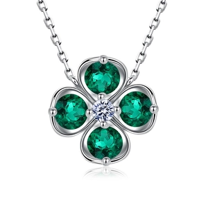 Elegant S925 silver necklace with a four-leaf clover green gemstone pendant on white base
