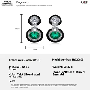 Detailed view of S925 silver emerald earrings with black enamel and 22x14mm dimensions