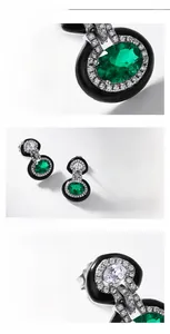 Macro detail of emerald stud earrings featuring S925 silver and vintage halo design