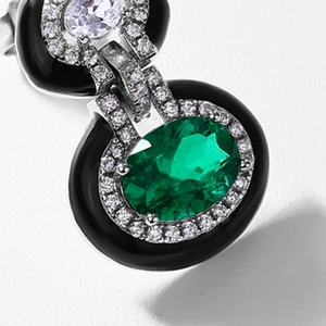 Geometric emerald and S925 silver stud earrings with black enamel and white zircon details