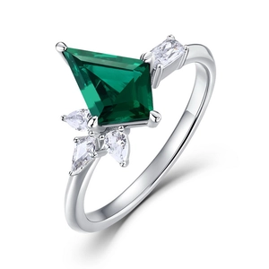 Kite-cut lab emerald S925 silver ring with mixed cluster accent stones on white background
