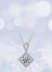 Close-up of S925 silver necklace with brilliant round lab-grown diamond in halo setting