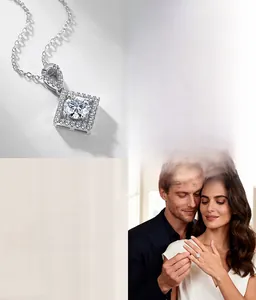 Close-up of geometric lab-grown diamond pendant and ring set in S925 sterling silver