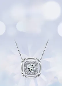 Macro shot of silver S925 geometric necklace featuring a square halo lab diamond pendant